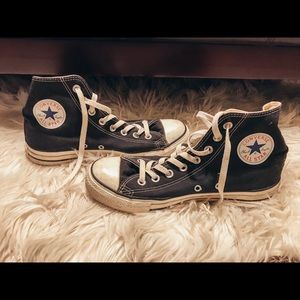Black hightop converse tennis shoes